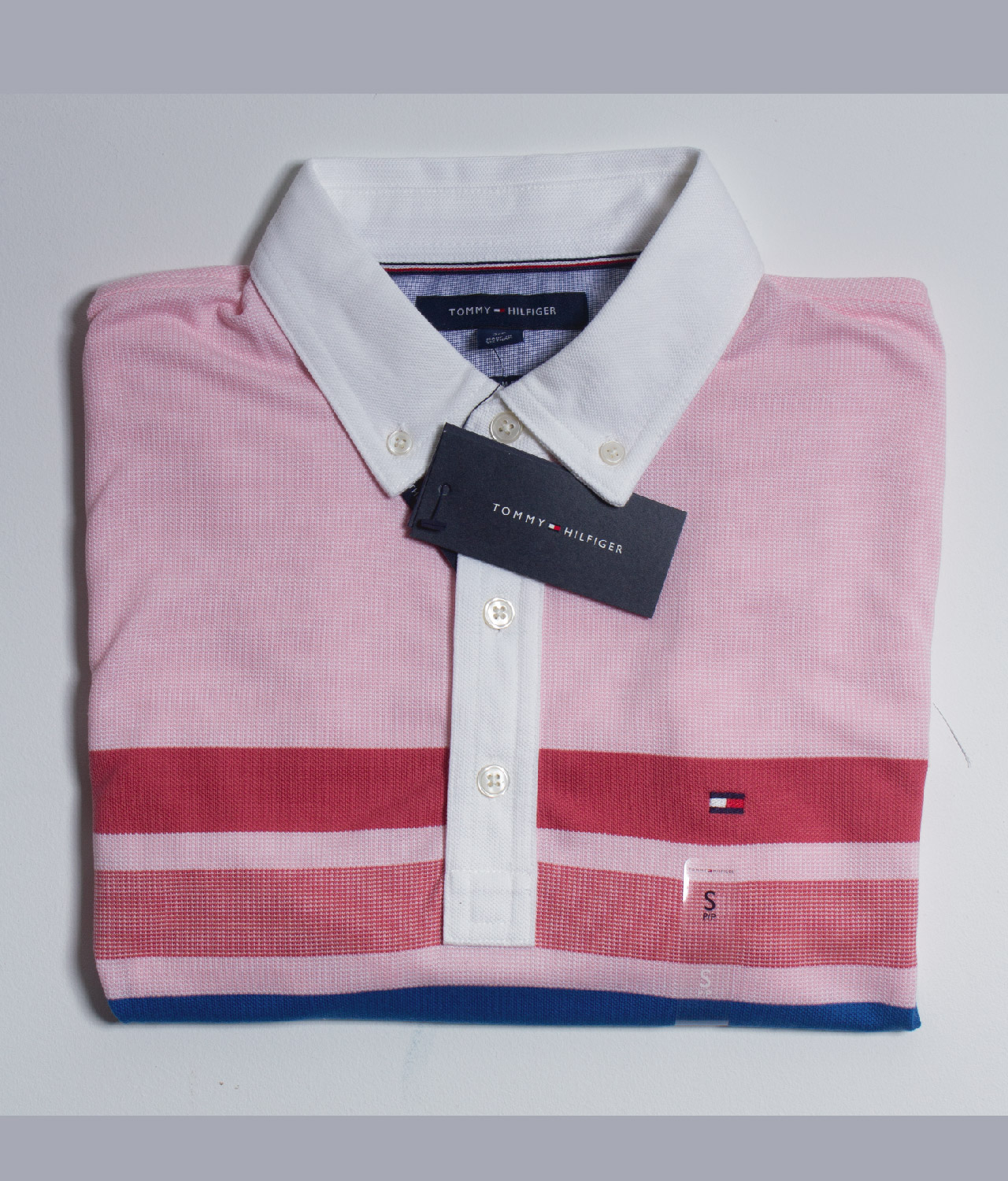 Camiseta Tommy tipo polo con franjas – UGANU. Compra en linea ropa, zapatos  y más